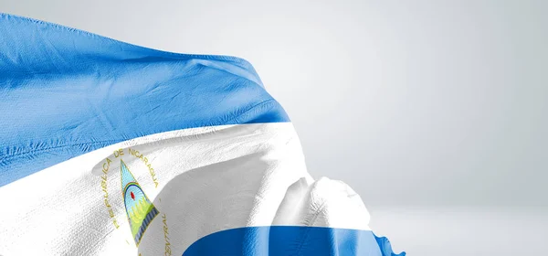 Nikaragua Národní Vlajka Tkaniny Vlnění Krásné Šedé Světlo Pozadí — Stock fotografie