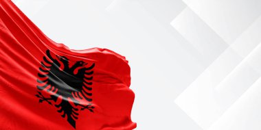Arnavutluk ulusal bayrak kumaşı güzel beyaz arka planda dalgalanıyor.