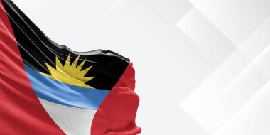 Antigua ve Barbuda Ulusal Bayrak Kumaşı Güzel beyaz arka planda sallanıyor.