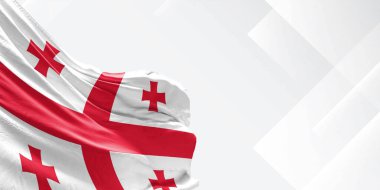 Gürcistan ulusal bayrak kumaşı beyaz arka planda sallanıyor.