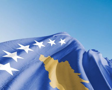 Kosova ulusal bayrak kumaşı güzel mavi arka planda dalgalanıyor.