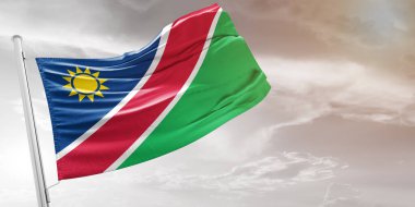 Namibya Ulusal Bayrak Kumaşı Güzel açık gri arka planda dalgalanıyor.