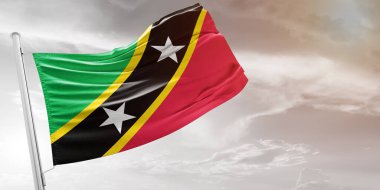 Saint Kitts ve Nevis Ulusal Bayrak Kumaşı Güzel açık gri arka planda sallanıyor.