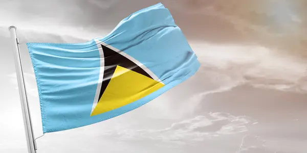 Saint Lucia Ulusal Bayrak Kumaşı Güzel açık gri arka planda dalgalanıyor.