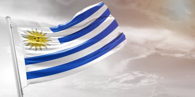 Uruguay Ulusal Bayrak Kumaşı Güzel açık gri arka planda dalgalanıyor.
