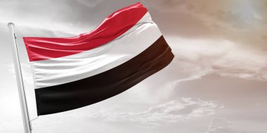 Yemen Ulusal Bayrak Kumaşı Güzel açık gri arka planda sallanıyor.