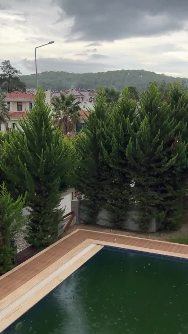 Tropical Shower Mountain Cloudy Sky Pine Trees Swimming Pool Vertical — Stock Video