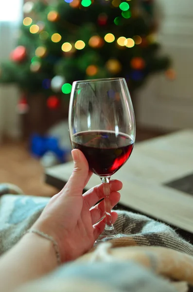 Woman Holding Red Wine Sofa Glass Wine Background Garlands Bokeh — Stock Photo, Image