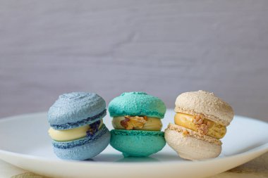 Tatlı badem ezmesi, tatlı tatlı tatlı, tatlı, tatlı, fırında. Fransız tatlısı, fırın. Yemek teslimatı. Makaroonlar, dekor.farklı aromalar. Ev yapımı kekler. Kafe reklamı. Güzel tatlı. Narin krema. Yemek pişirme..