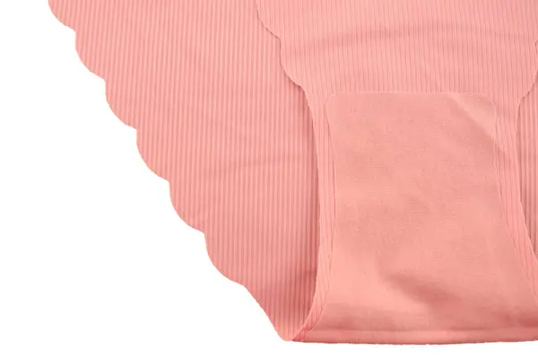 Şeftali pembesi dikişsiz (görünmez) kadın iç çamaşırı (iç çamaşırı, külot, külot) dalgalı kenar izole yakın çekim