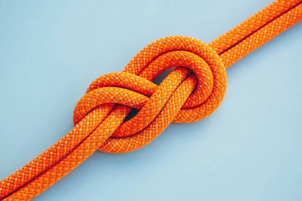 Acht Knoten Einem Seil Auf Blauem Hintergrund Nahaufnahme — Stockfoto