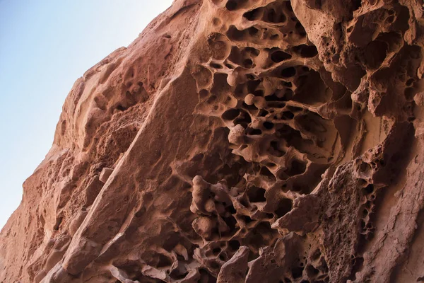 stock image Geology and tectonic plates. Sedimentary rocks natural texture and pattern. Closeup view of red canyon rock balls and prehistoric fossils in a jurassic cave in La Rioja, Argentina.