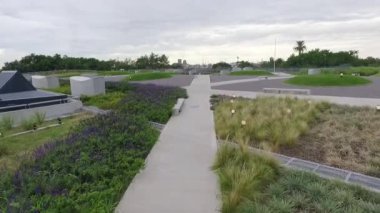 Aerial view following the paths of a public urban garden