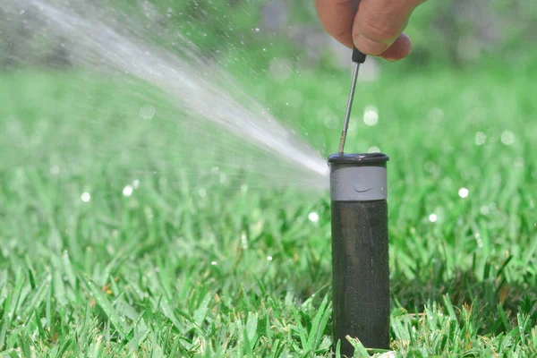 Adjusting Sprinkler Screwdriver Garden Maintenance Concept — Stock Photo, Image