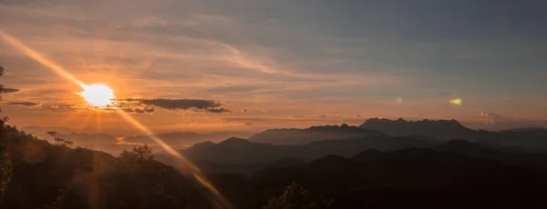 stock image sunset over the mountains in  chiahg mai thailand