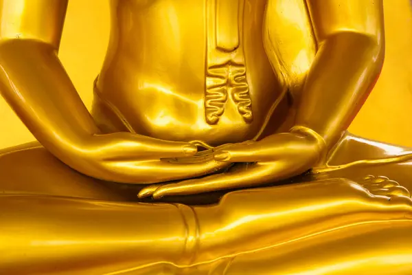 stock image hand golden buddha in temple thailand