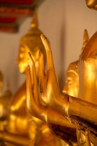 hand golden buddha in wat po bangkok,thailand