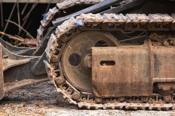 Bir ağır inşaat makine caterpillar kavramını closeup.