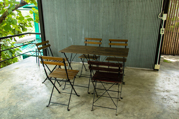 folding chair and table at a terrace