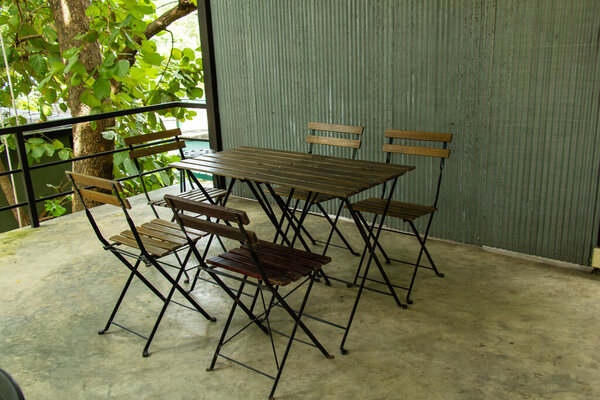 folding chair and table at a terrace