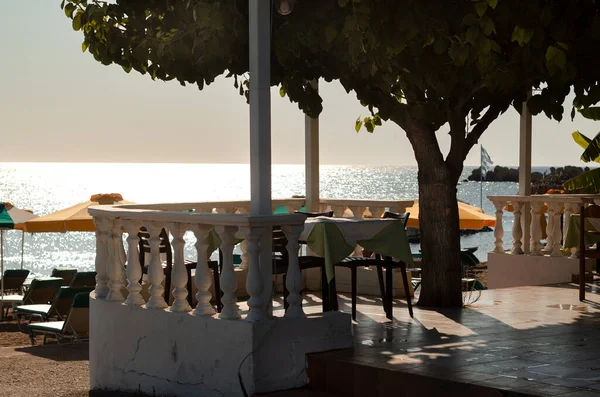 Empty Greek restaurant on the Mediterranean Sea in Rhodes
