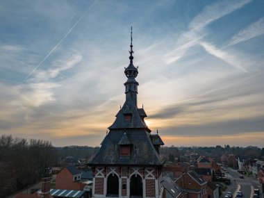 Emblem, Ranst, Belgium, 15th of February, 2023, Old Town Hall of Emblem, in the dorpstraat of the Little village of Emblem, in the Antwerp area aerial photo during evening sunset, showing the houses