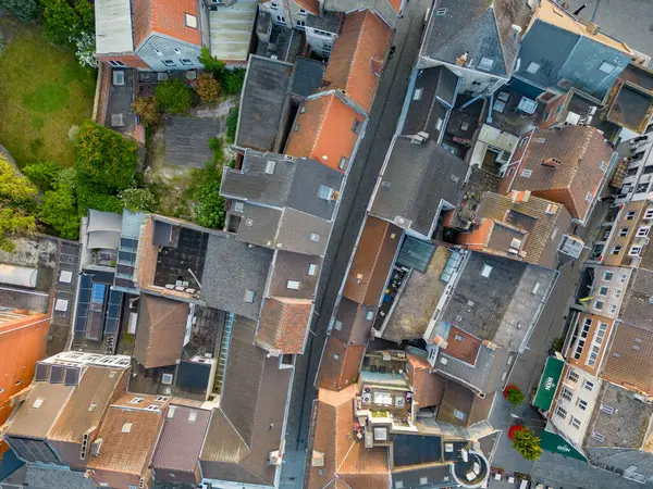 stock image Aerial top view of residential area houses roofs and streets from above, old town background, Belgium, Europe. High quality photo