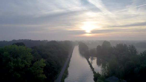 Stock Footage Majestic Sunrise Unfolds Mist Clad Canal Flanked Dense — Stock Video