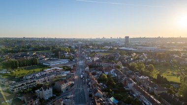 Bergensesteenweg, Sint-Pieters-Leeuw, Brussels, Belgium, 18th of May, 2024, This aerial photograph captures Bergensesteenweg in Sint-Pieters-Leeuw, Brussels, Belgium, during sunset. The image clipart