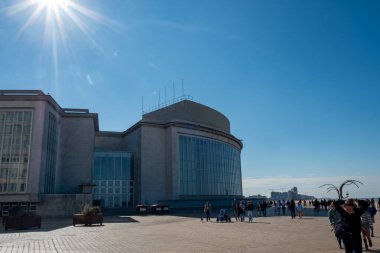 Oostend, Belgium, October 6th, 2024, The casino, A breathtaking and stunning view of a contemporary, modern building set against a vibrant, clear blue sky clipart