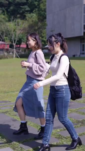 Vertical Slow Motion Video Two Young Taiwanese Female College Students — Stock Video