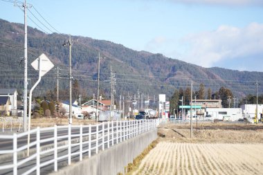 14 Ocak 2025: Komagane Şehri, Nagano Bölgesi, Japonya 'daki dağların manzarası. 