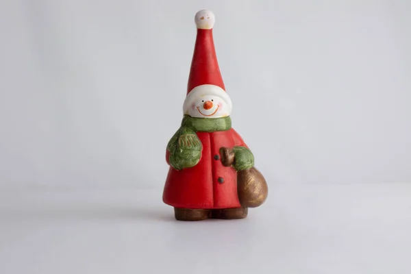 Christmas Decoration Figure Snowman Red Hat Jacket Green Scarf Figure — Stock Photo, Image