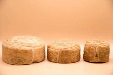 Three nude New York rolls