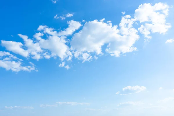 Blue sky background with clouds.