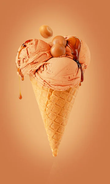 Caramel ice cream in a waffle cone. Close up