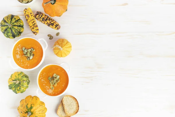 Pumpkin Soup Seeds White Wooden Background Directly Copy Space — Fotografie, imagine de stoc