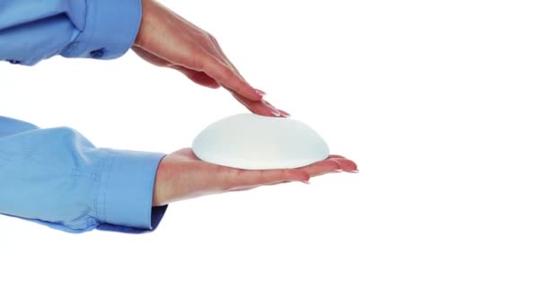Woman Pressing Soft Breast Implant Demonstrating Its Softness Breast Augmentation — Stock Video