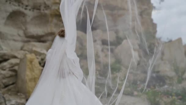 Bride Groom Embracing Cliff Embankment Bride Waving Veil Slow Motion — Stock Video