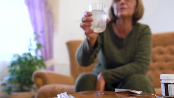 Senior Woman Glass Medicine Water Hands Sits Bed Home Aged — Stockvideo
