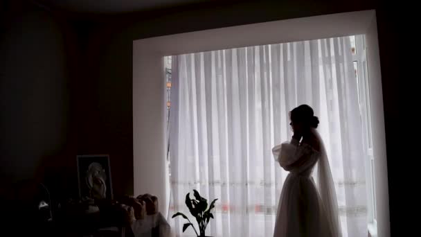 Silhouette Bride White Long Dress Background Bright Window High Quality — Vídeo de Stock