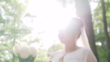 Hot man showing tenderness woman in garden. Portrait of sexy couple expressing feelings in park. Close up gorgeous bride and groom kissing on wedding ceremony outdoors. High quality FullHD footage