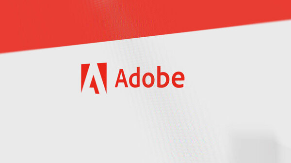 28th July 2023 San Jose, California. The logo of Adobe Inc. on a white wall of screens. Adobe Inc  brand on a device.