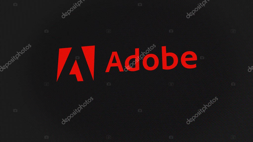 07th September 2023 San Jose, California. The logo of Adobe Inc. on a white wall of screens. Adobe Inc  brand on a device.