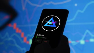 19 Eylül 2023. Beam 'in fiyatını analiz eden bir yatırımcı, kripto $Beam limitin üzerine çıktı ve fiyatın üstüne çıktı..