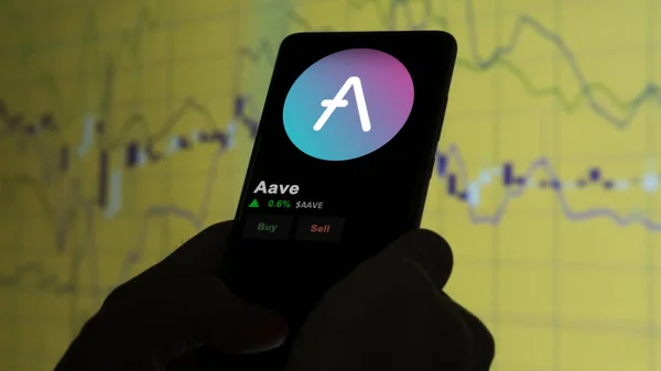 stock image September 19th 2023. An investor analyzing the price of aave, the crypto $AAVE broke out above the limit, AAVE and climbs above the price.