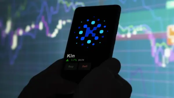 stock image September 19th 2023. An investor analyzing the price of Kin, the crypto $KIN broke out above the limit, KIN and climbs above the price.