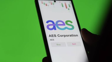 AES Şirketi 'nin logosu bir değiş tokuş ekranında. AES Kurumsal Fiyat Hisseleri, Bir aygıt üzerinde $AES.