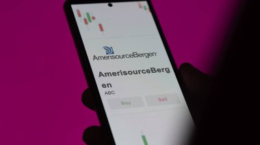 AmerisourceBergen 'in logosu bir değiş tokuş ekranında. AmerisourceBergen hisse senetleri, ABC $bir aygıt üzerinde.