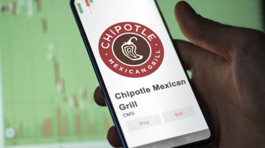 Bir değiş tokuş ekranında Meksika usulü ızgara logosu. Meksika usulü Chipotle Grill hisse senetleri, bir cihaza CMG $.